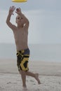 Young boy playing catch on the beach great focus Royalty Free Stock Photo