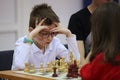 Young boy playing chess