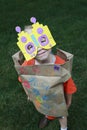 Young boy playing dress up as a robot