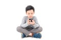 Young boy playing games on smart phone Royalty Free Stock Photo