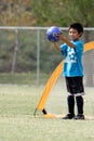 Young boy playing goalie in soccer Royalty Free Stock Photo