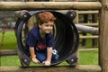 Young boy playing on a jungle gym Royalty Free Stock Photo