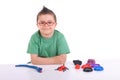 Young boy playing with modeling clay Royalty Free Stock Photo