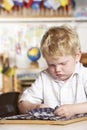 Young Boy Playing at Montessori/Pre-School Royalty Free Stock Photo