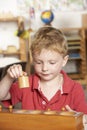Young Boy Playing at Montessori/Pre-School Royalty Free Stock Photo