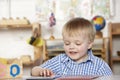 Young Boy Playing at Montessori/Pre-School Royalty Free Stock Photo