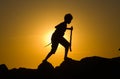 Young boy playing on rocks