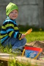 Young boy playing in the sandbox Royalty Free Stock Photo