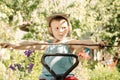 Young boy playing with a stick and gesturing Royalty Free Stock Photo