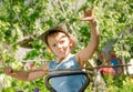 Young boy playing with a stick and gesturing Royalty Free Stock Photo