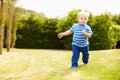 Young Boy Playing In Summer Garden Royalty Free Stock Photo