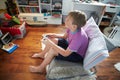 Young Boy Playing Video Game In Bedroom Royalty Free Stock Photo