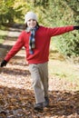 Young boy playing in woods Royalty Free Stock Photo