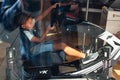 Young boy playing XBox racing car simulator