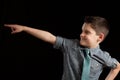 Young Boy Pointing In Direction Royalty Free Stock Photo