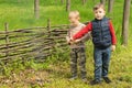 Young boy pointing excitedly to a small fire Royalty Free Stock Photo