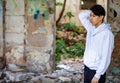 Young boy in an abandoned house