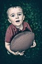 Young Boy Posing with Football - Retro Royalty Free Stock Photo