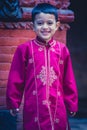 Young boy posing in traditional clothes in nepal