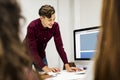 Young boy presenting a project to the team Royalty Free Stock Photo