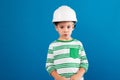 Young boy in protective helmet posing and looking at camera Royalty Free Stock Photo