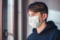 young boy with protective mask infection fear concept - quarantine at home