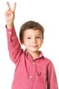 Young boy with raised hand