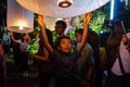 A young boy releases a floating lantern in Chiang Mai, Thailand