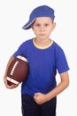 Young boy and rugby ball Royalty Free Stock Photo