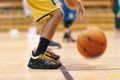 Young Boy's Intense Basketball Training on the Court of Champions. School Kids Showcasing Basketball Skills Royalty Free Stock Photo