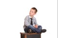 Young boy sat cross-legged