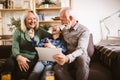 Boy showing his older grandparents new technology Royalty Free Stock Photo