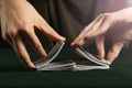 Young boy Shuffling a Deck of playing Cards Royalty Free Stock Photo