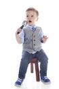 Young boy Singing or Speaking into Microphone Royalty Free Stock Photo