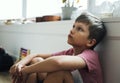 Young boy sitting with depression Royalty Free Stock Photo