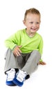 Young boy sitting - isolated