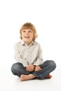 Young Boy Sitting In Studio Royalty Free Stock Photo