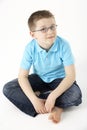 Young Boy Sitting In Studio Royalty Free Stock Photo