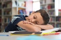 School boy sleeping on books Royalty Free Stock Photo