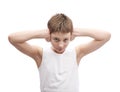 Young boy in a sleeveless shirt Royalty Free Stock Photo