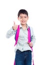 Young boy smiling and showing thumb up over white Royalty Free Stock Photo