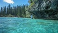 Young boy snorkeling in natural swimming pool of Oro Bay, Isle of Pines, New Caledonia Royalty Free Stock Photo