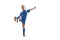 Young boy with soccer ball doing flying kick Royalty Free Stock Photo