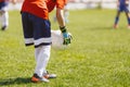 Young Boy Soccer Football Goalkeeper Holding Ball in Hand Gloves Royalty Free Stock Photo