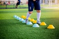 Young boy soccer players Jogging and jump between ladder drills for football training. Ladder drills exercises for football or Royalty Free Stock Photo