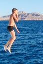 Boy swiming at red sea Royalty Free Stock Photo