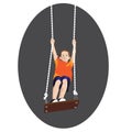 Young boy standing on a tree swing Royalty Free Stock Photo