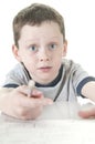 Young boy stressed with work Royalty Free Stock Photo