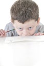 Young boy stressed with work Royalty Free Stock Photo