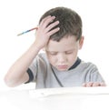 Young boy stressed with work Royalty Free Stock Photo